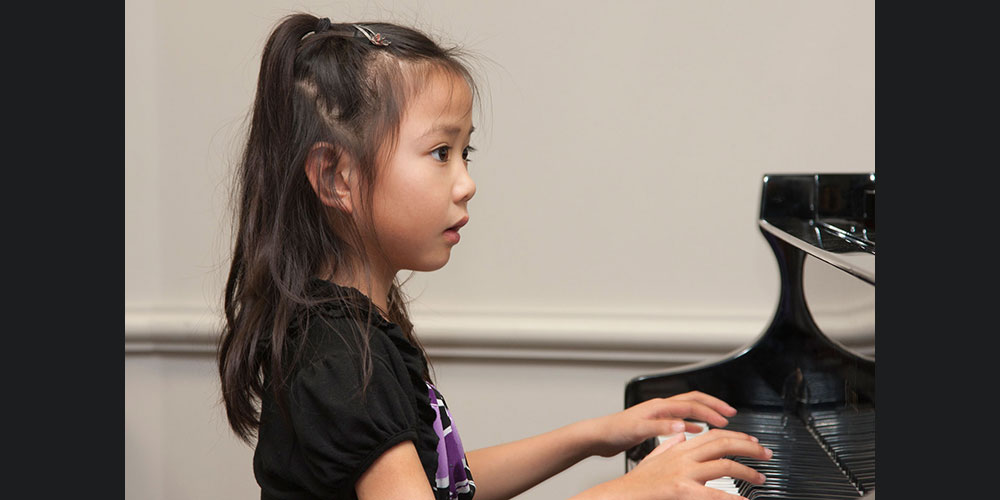 Helen plays piano